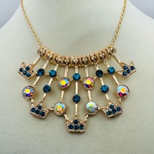 BETSY JOHNSON Gold Tone Crown Necklace with Blue and AB Crystals